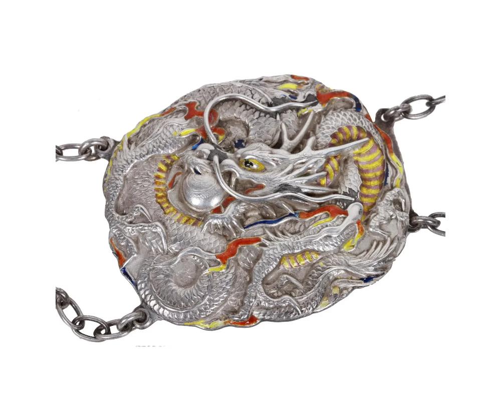 An antique Japanese Meiji period repousse silver belt consisting of buckles link 2