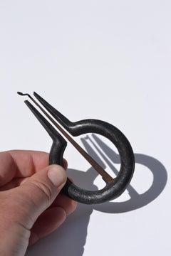 An antique jaw harp made of iron and cast iron - France - Early XXth