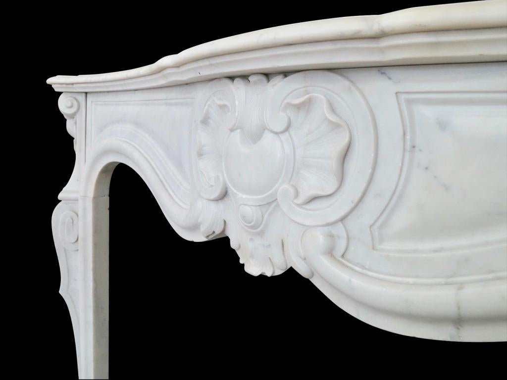 Carved Antique French Louis XV Carrara Marble Fireplace Mantel