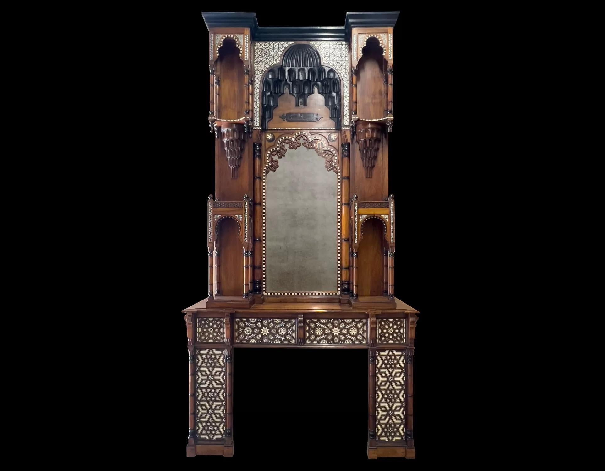 A large antique Moorish revival style walnut fireplace with ebony and mother of pearl inlays.
This extremely rare Moorish style Moroccan fireplace, dating back to the year 1900 features intricate geometric mother of pearl and ebony inlays, horseshoe