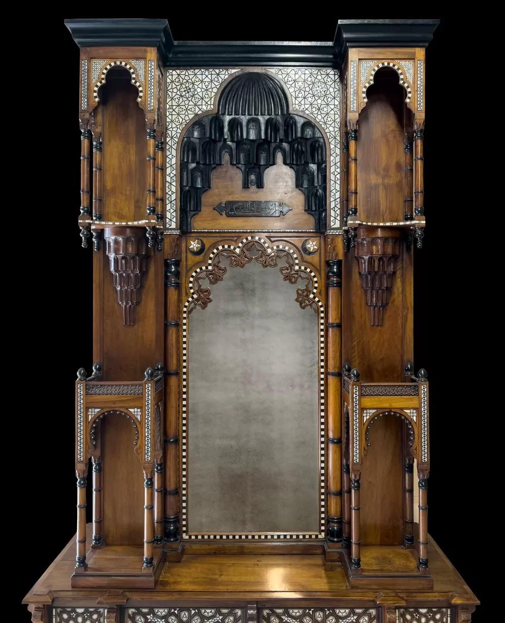 Inlay An antique Moorish revival style walnut fireplace with inlays. For Sale