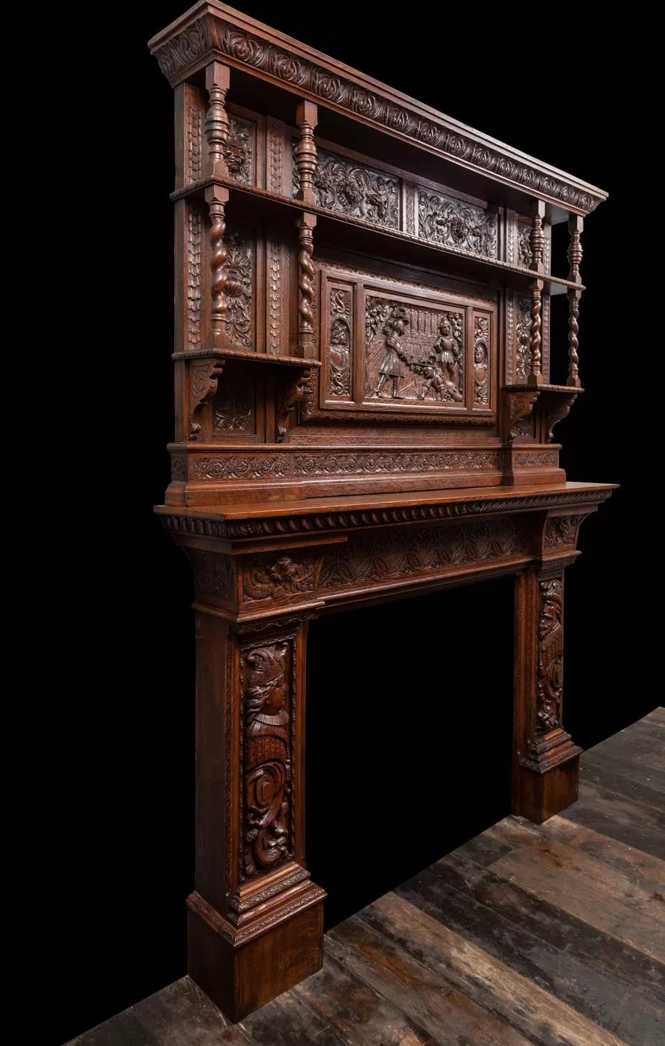 An antique oak fireplace surround, made in the Jacobean style. In Good Condition For Sale In Tyrone, Northern Ireland