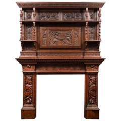 Un'antica cornice per camino in Oak, realizzata in stile giacobino.