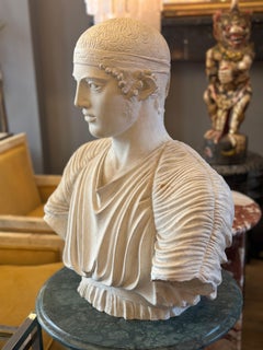 An Antique Plaster Bust Of The Charioteer Of Delphi