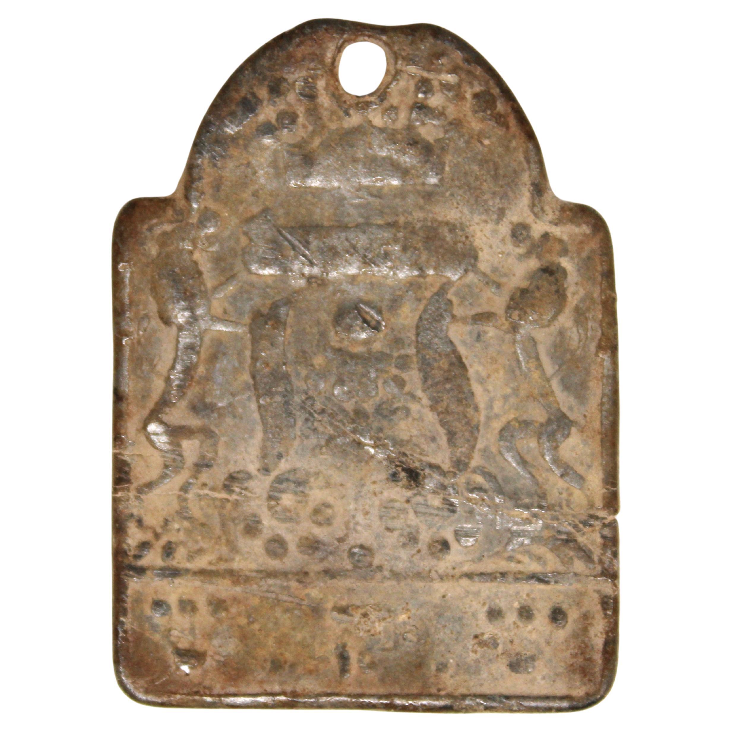 An Antique Polish Lead Amulet