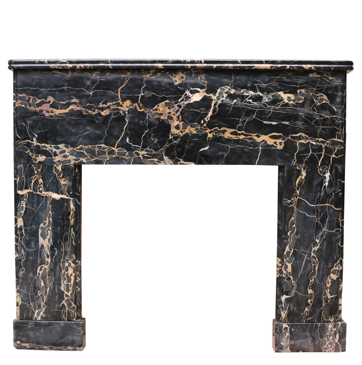 A striking Art Deco Period fire surround in Italian black and gold Portoro marble. Sourced from Belgium.

Additional Dimensions:

Opening Height 80 cm

Opening Width 83.5 cm

Width between outside of legs 142.5 cm.