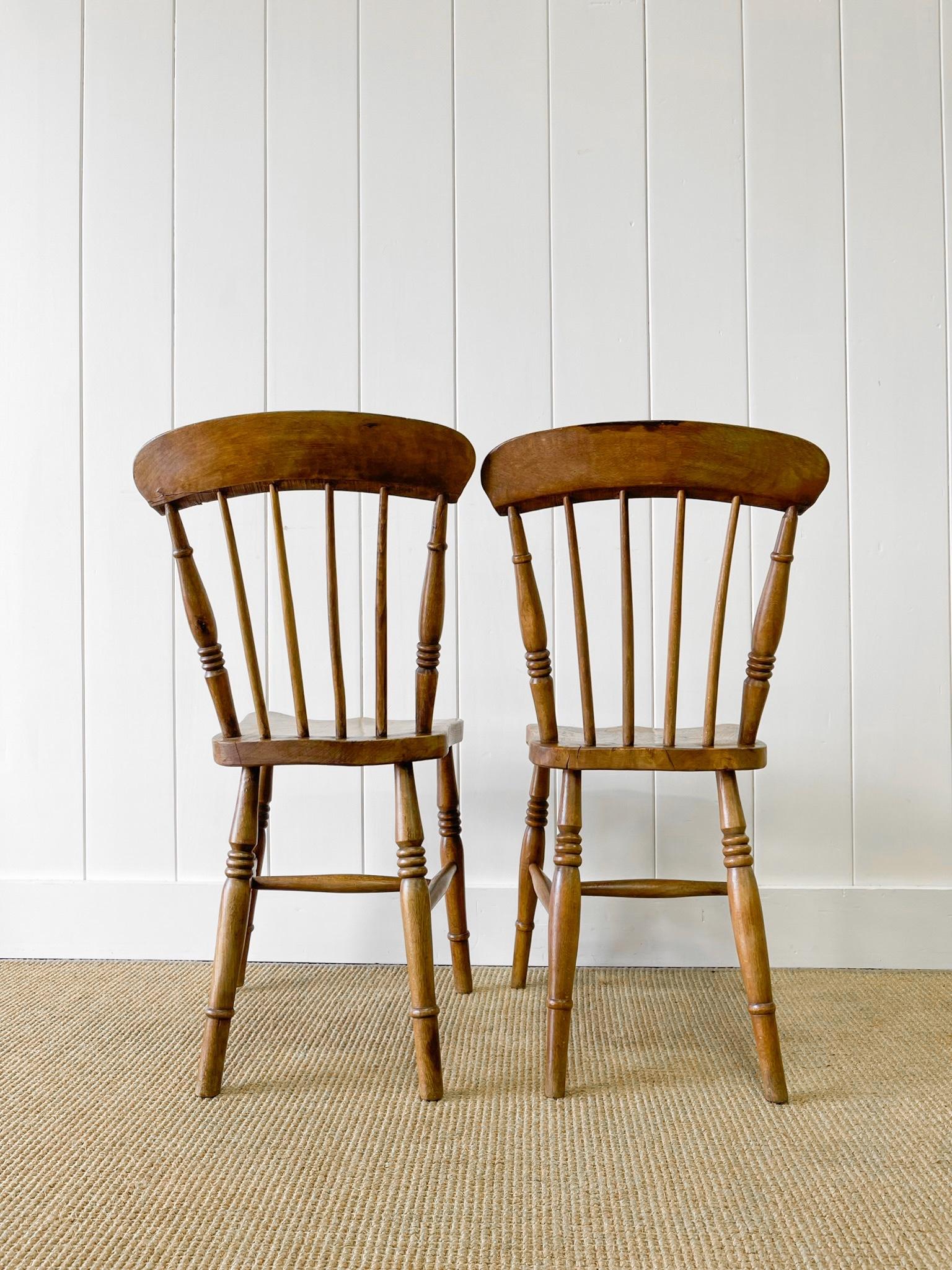 An Antique Set of 4 Early 19th Century Stick Back Chairs For Sale 13