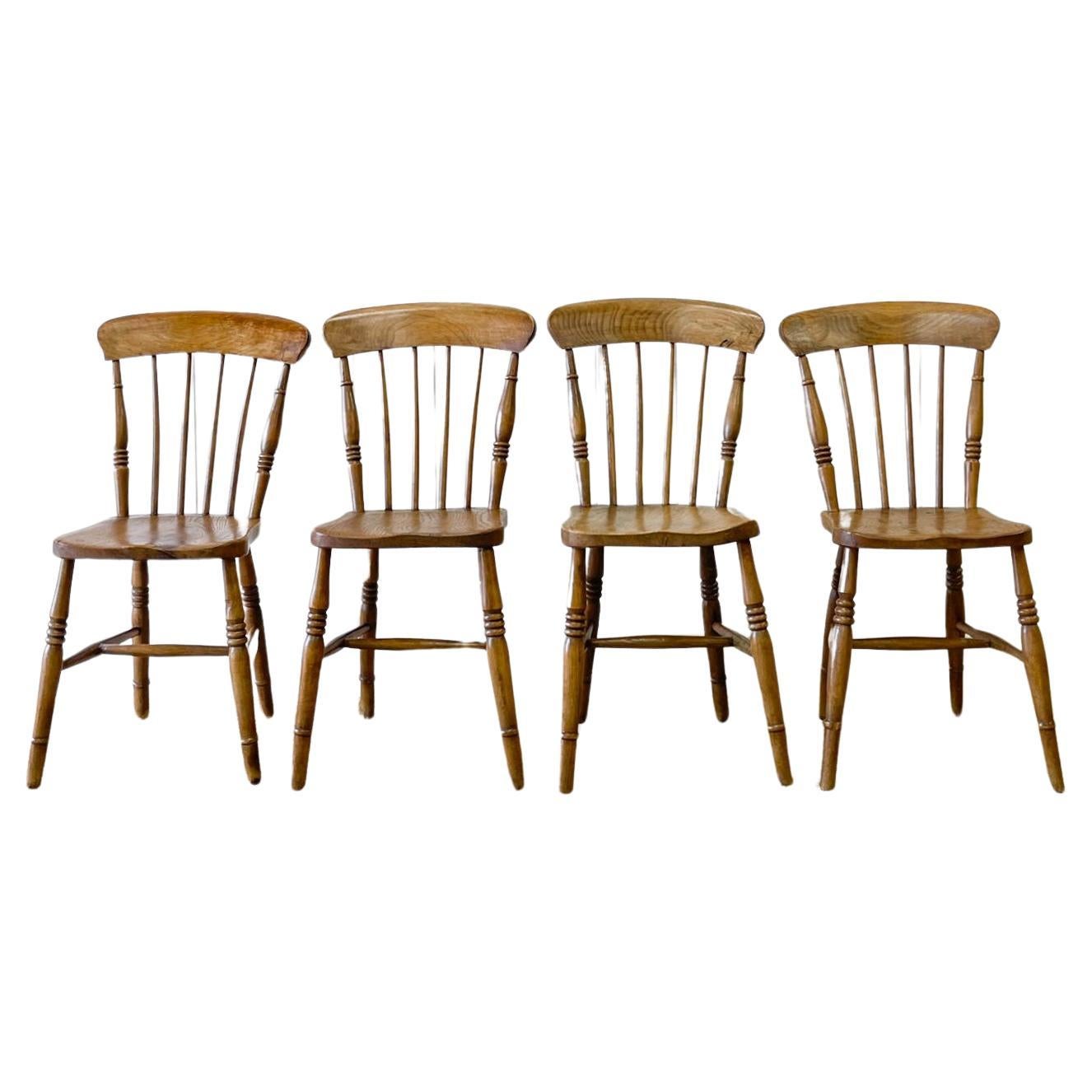 An Antique Set of 4 Early 19th Century Stick Back Chairs For Sale