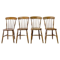 An Vintage Set of 4 Early 19th Century Stick Back Chairs