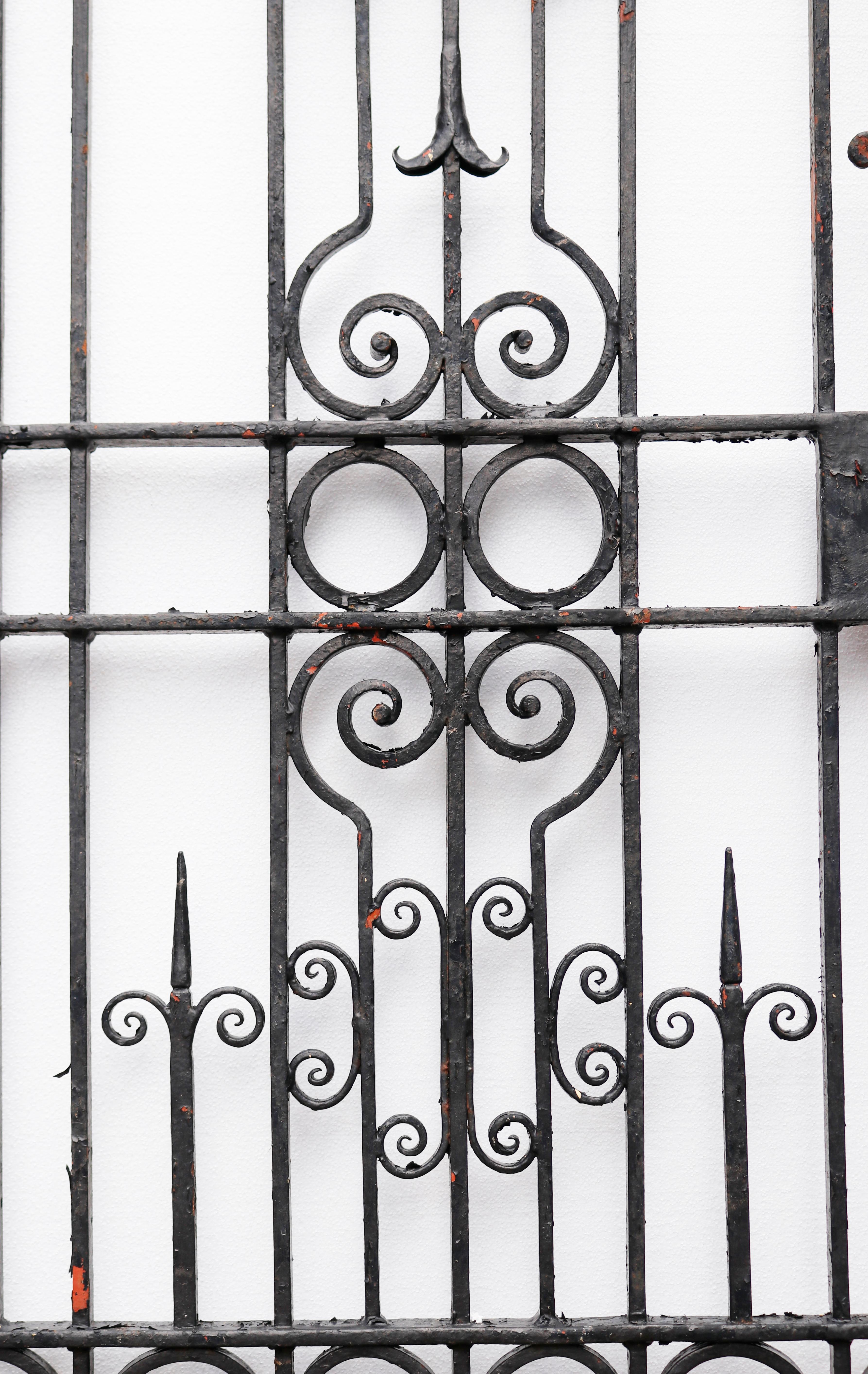 A reclaimed side gate made of wrought iron in the traditional style.

There is a matching set of wrought iron driveway gates available.