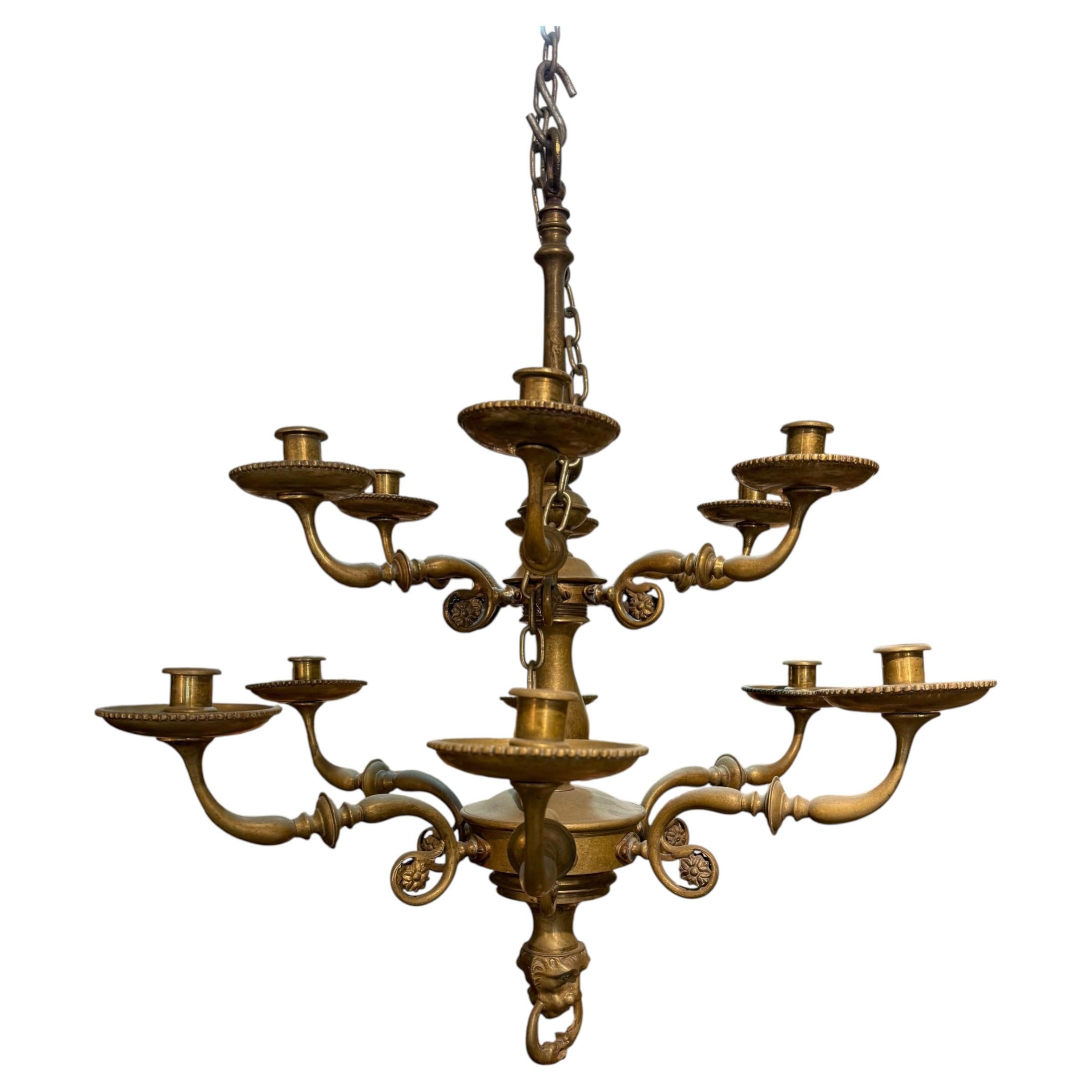 An Antique Spanish Two-Tier Bronze Twelve Light Chandelier, 19th Century For Sale