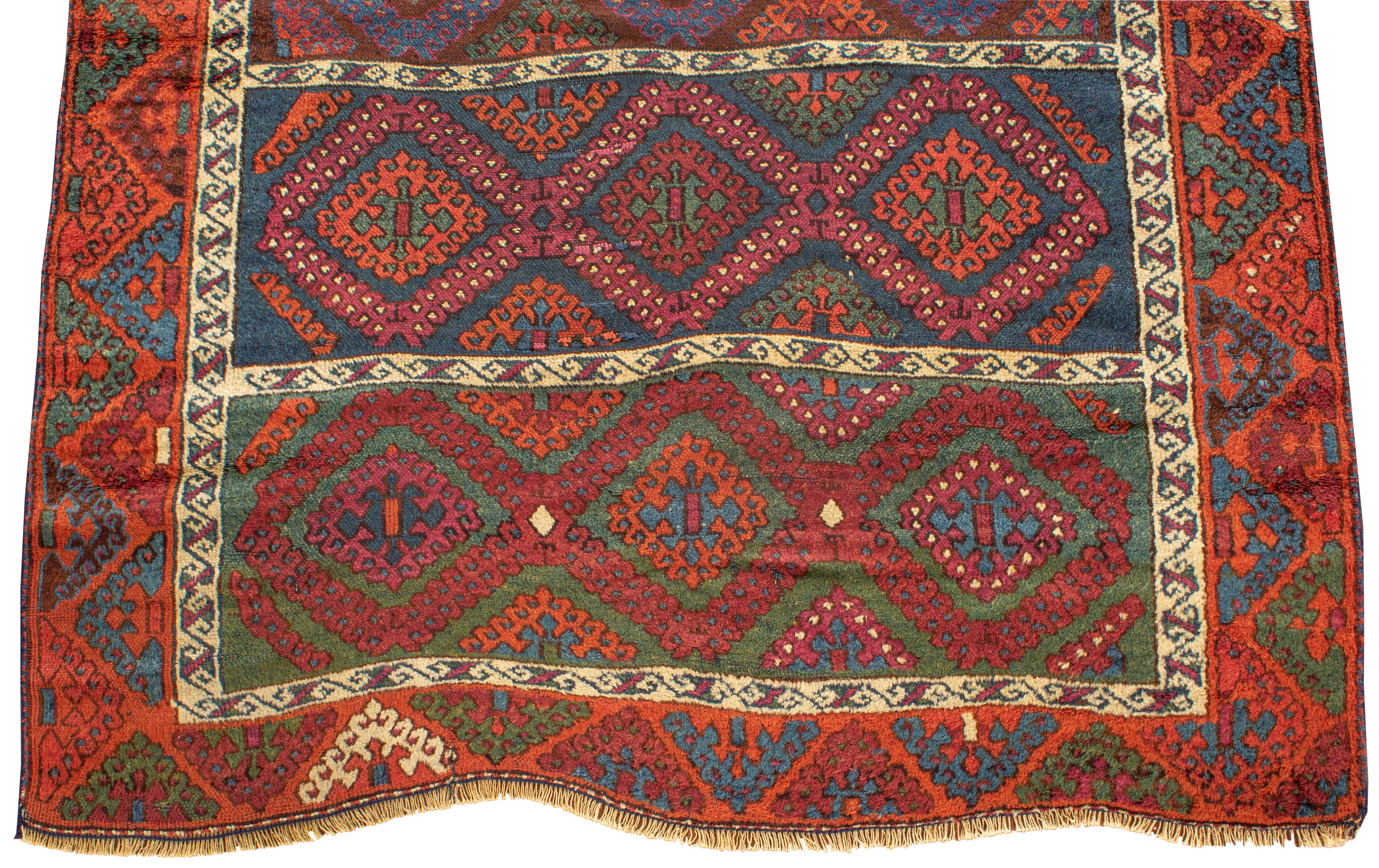 An antique Turkish Yoruk rug circa 1880. The Yoruk's are a tribal people that predate the Turkomans, primarily inhabiting the mountains of Anatolia and their weavings are detailed and difficult to find, each piece is unique. Size: 3'11 x 7'2.