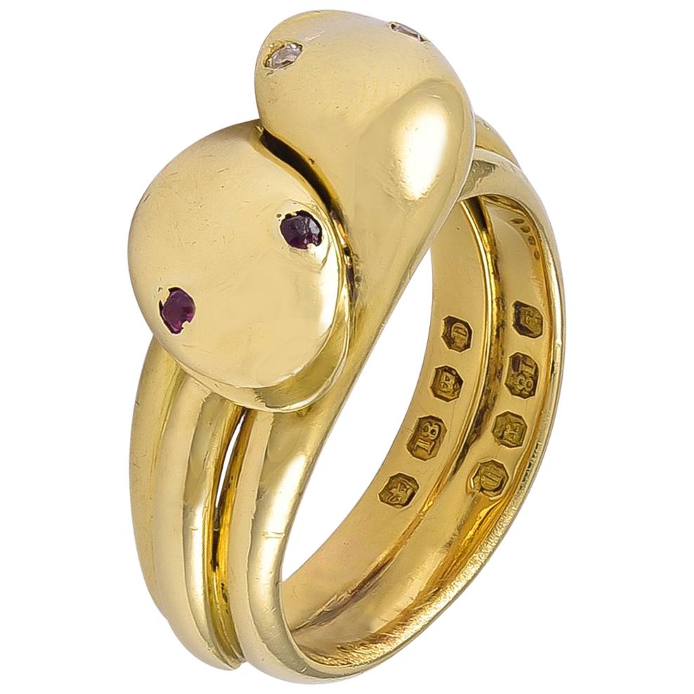 An Antique Victorian 18 Karat Gold double headed Snake Ring, Ruby & Diamond Eyes For Sale