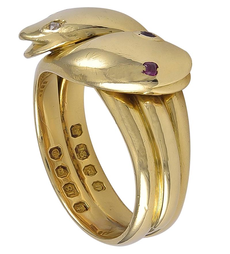 A beautifully made and well proportioned Snake Ring, the smiling Snakes with small bright Ruby and Diamond Eyes and each inner shank bears a full English London hallmark for 1879 and which are so mint that I do not think this Ring has been worn for