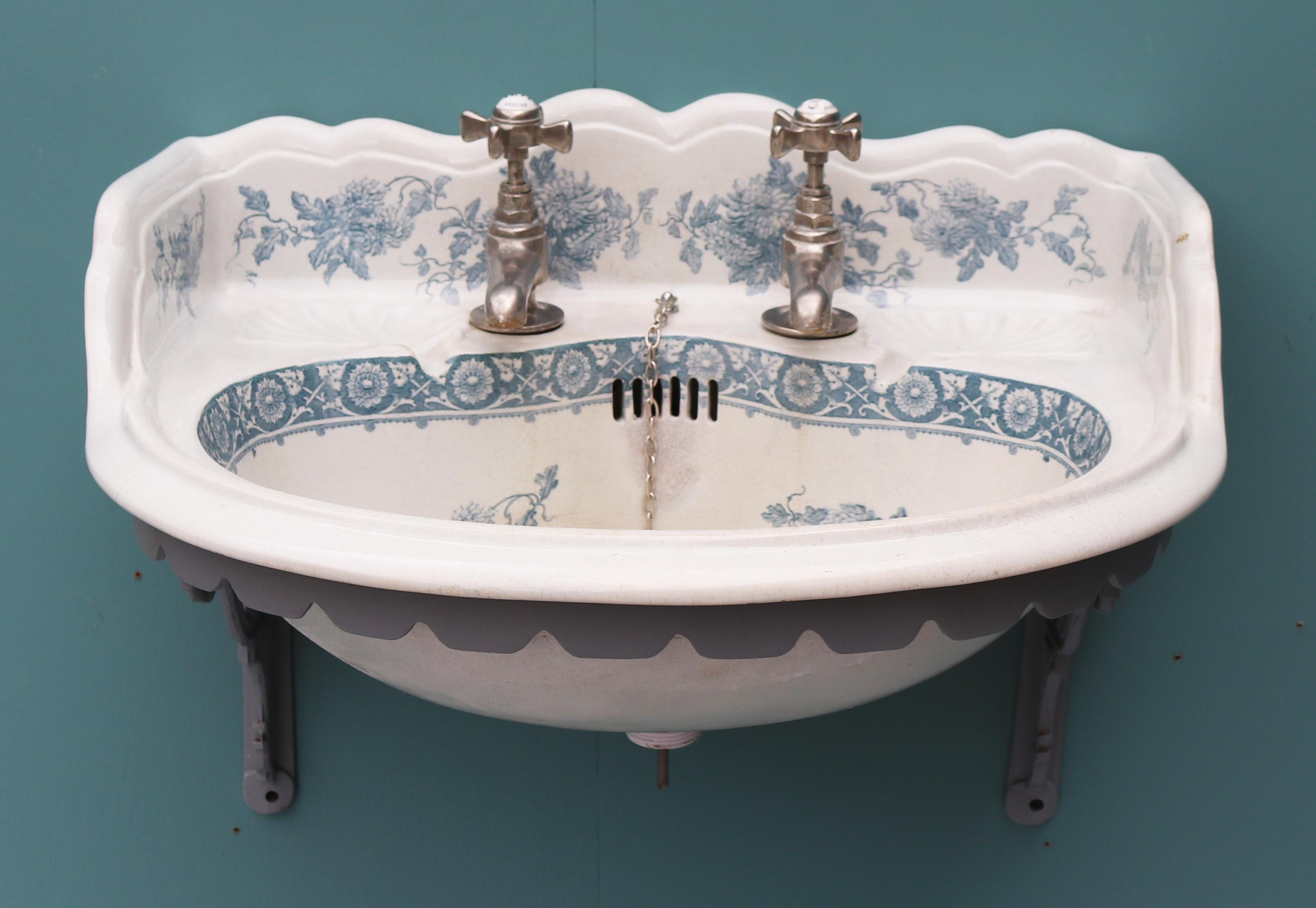 A reclaimed antique sink with its original cast iron wall mounted bracket.

 

Condition report

Good structural condition. There is slight discoloration to the bowl. The taps move freely, they are however untested. No cracks or
