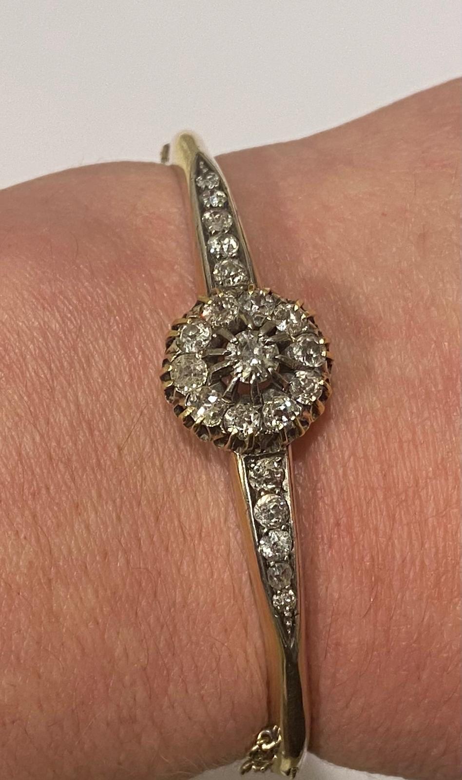 An Antique Victorian Gold and Old Cut Diamond Cluster Bangle Circa 1880