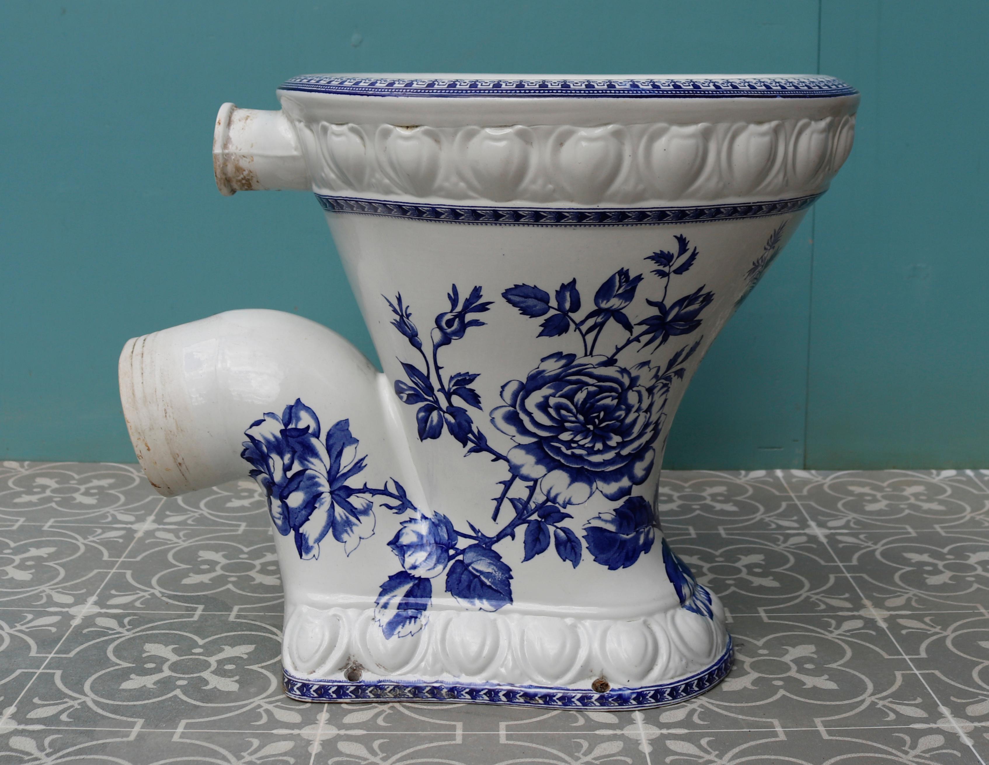 A reclaimed toilet with a blue and white transfer pattern called ‘The City’. This is a P-Trap model.