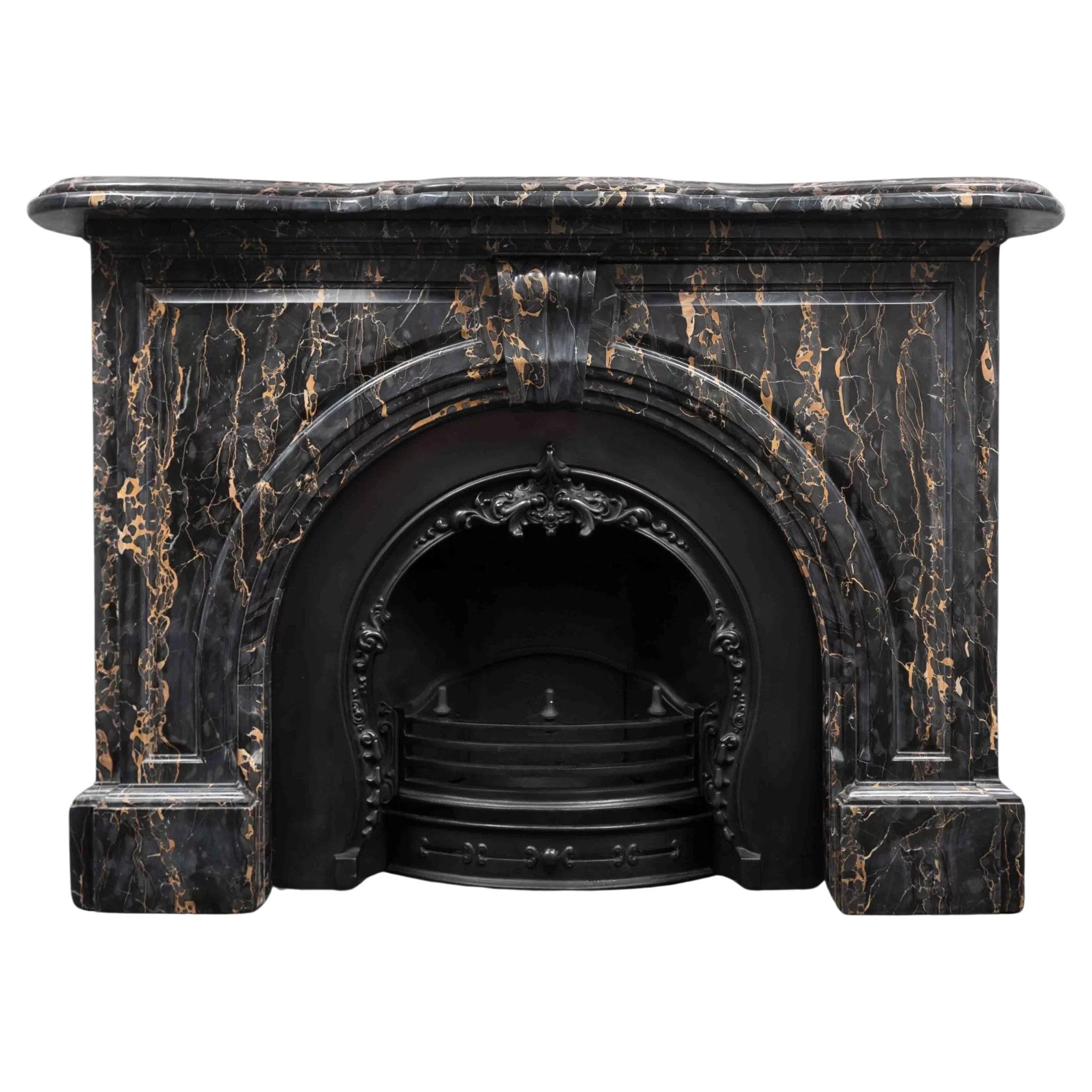 An antique Victorian period fireplace made from Portoro Nero marble