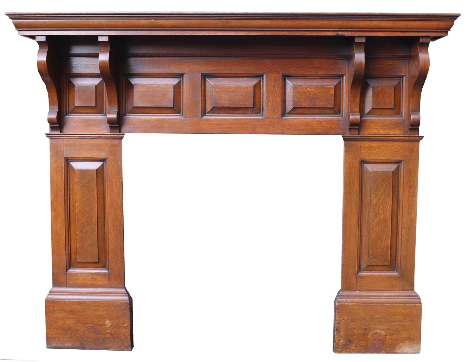 A large Victorian period oak fireplace with raised and fielded panelled frieze and jambs. The shelf supported on four oak corbels.

Additional dimensions:

Opening height 96 cm

Opening width 96.5 cm

Width between outside of legs 167 cm.
