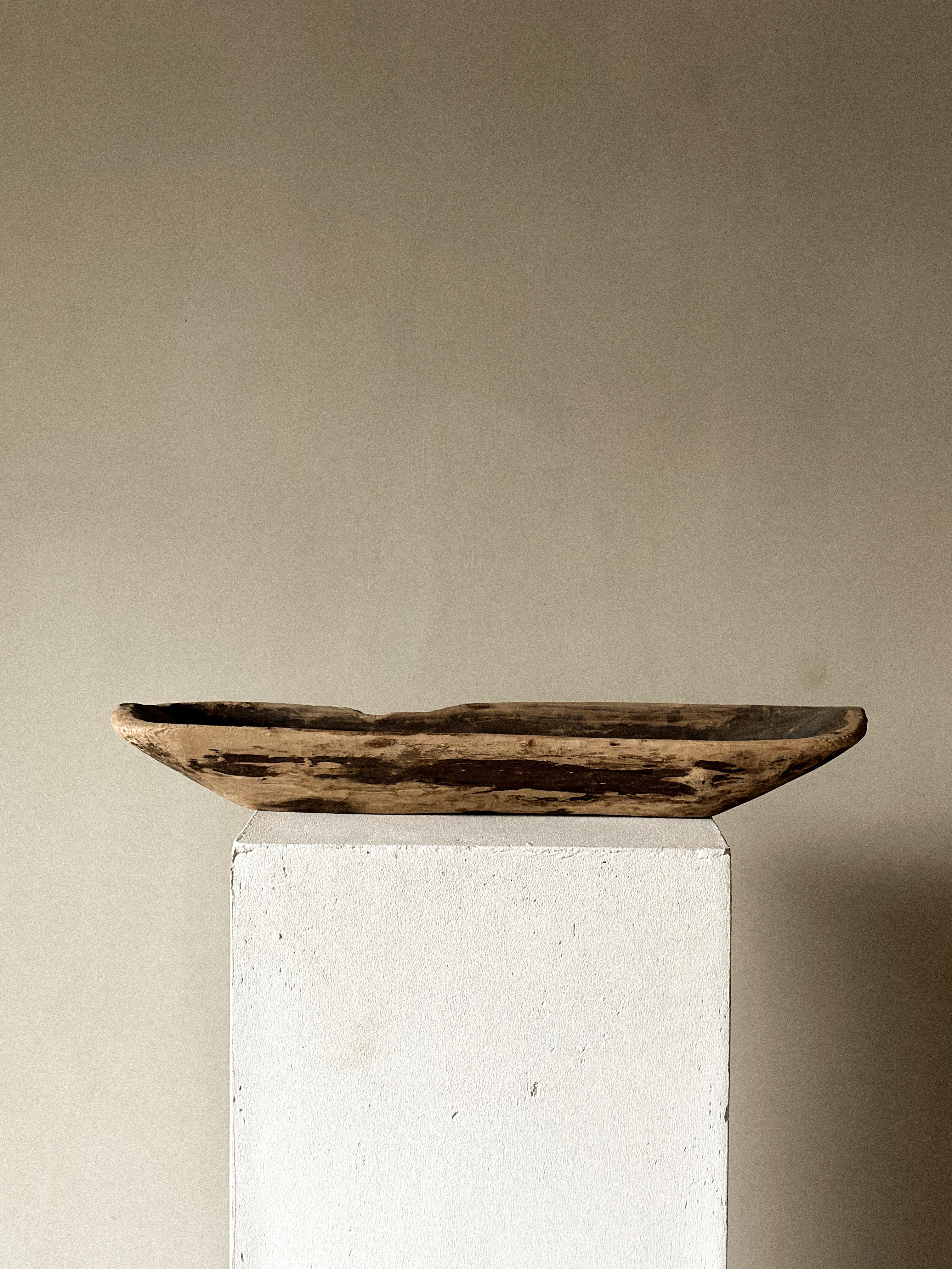 An antique wabi sabi tray with heavy patina from age and use. 