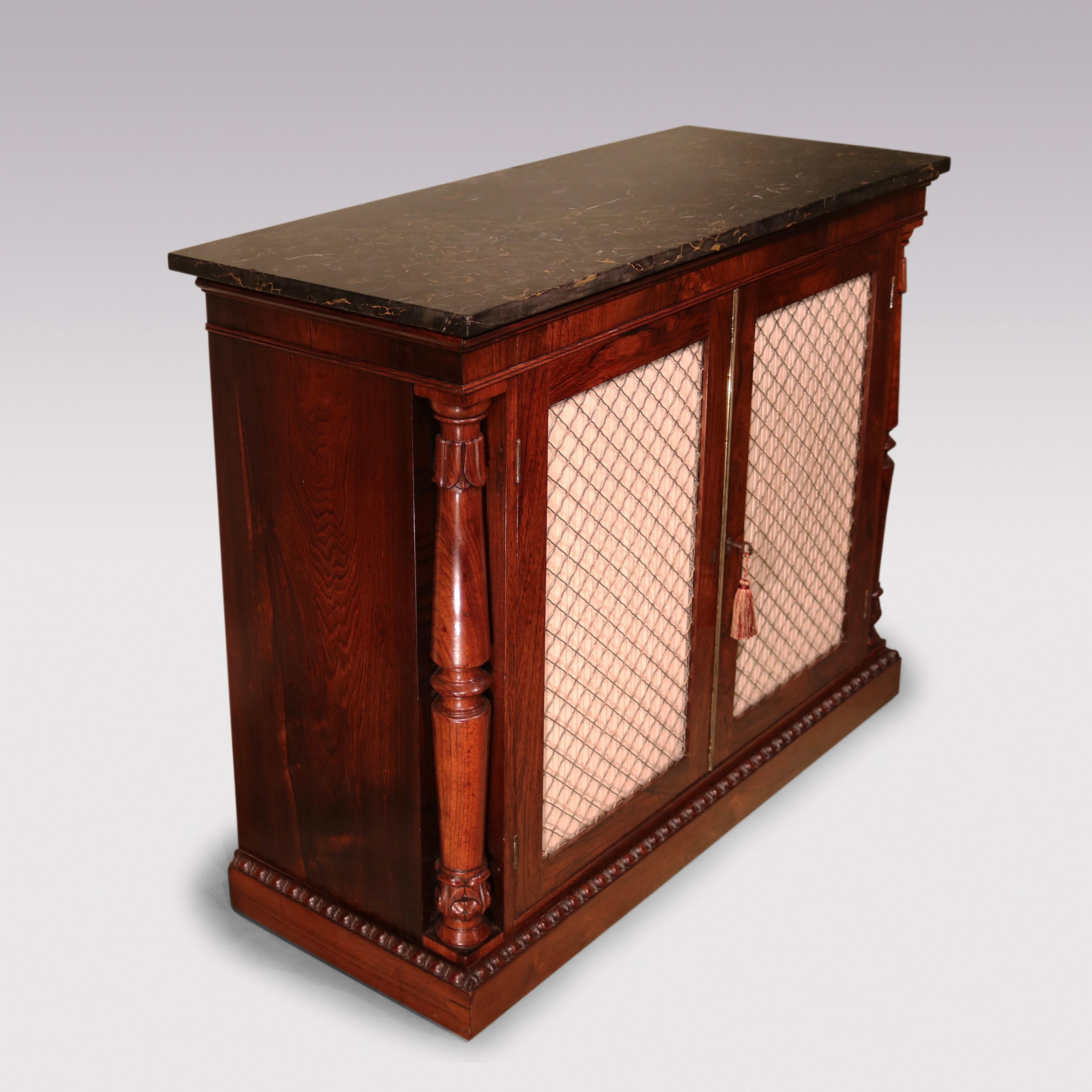 A fine quality William IV period rosewood 2-door Chiffonier, having original veined marble top above original brass grille pleated doors flanked by lotus-carved columns ending on beaded plinth base.