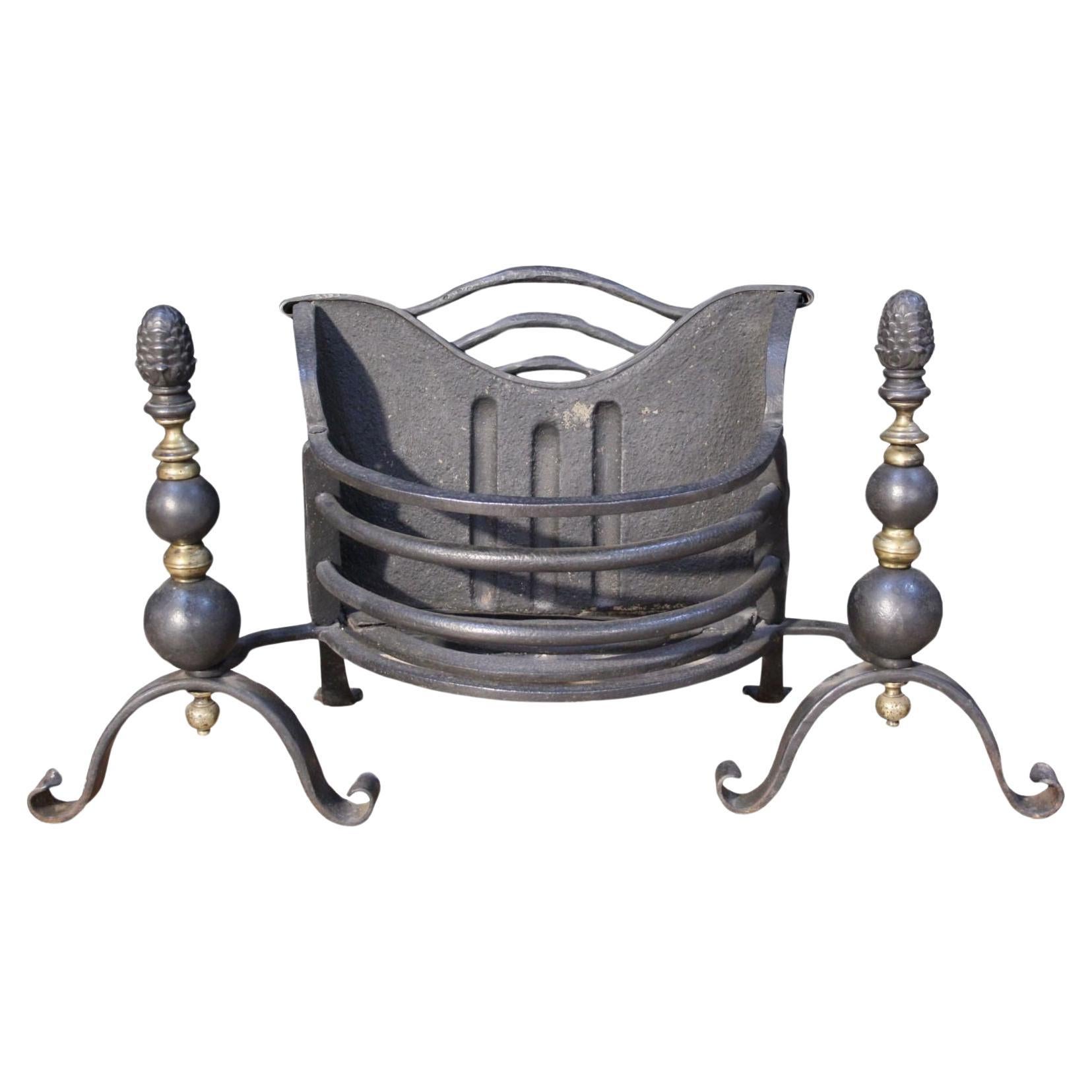An Antique Wrought Iron Fire Grate For Sale