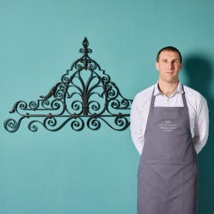 An Antique Wrought Iron Gate Overthrow