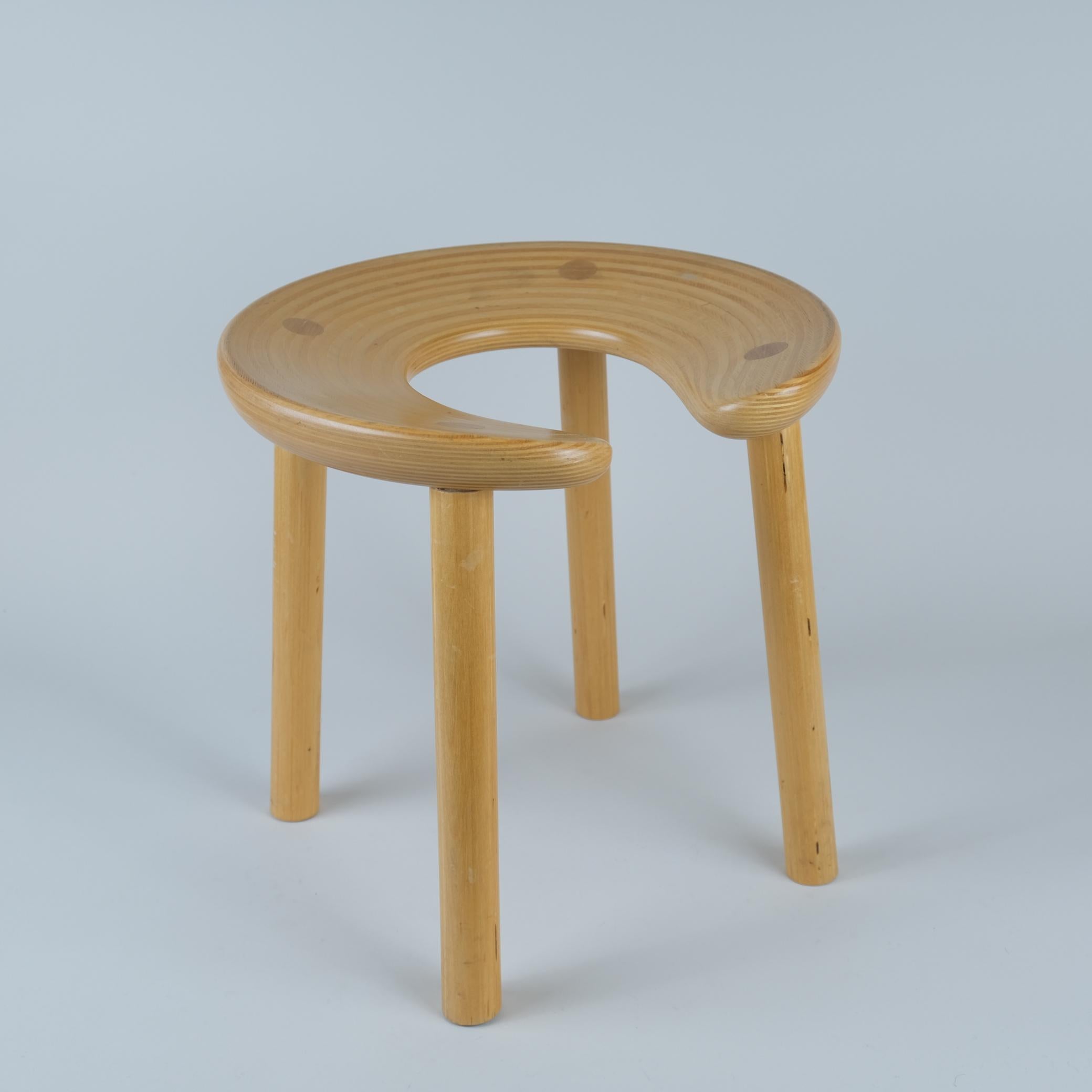 A stool by Antti Nurmesniemi, designed for the sauna section of the Palace Hotel in Helsinki in 1952. Antti's version and interpretation of a stool brilliantly modernised the traditional folk sauna stool while keeping the functional horseshoe-shaped
