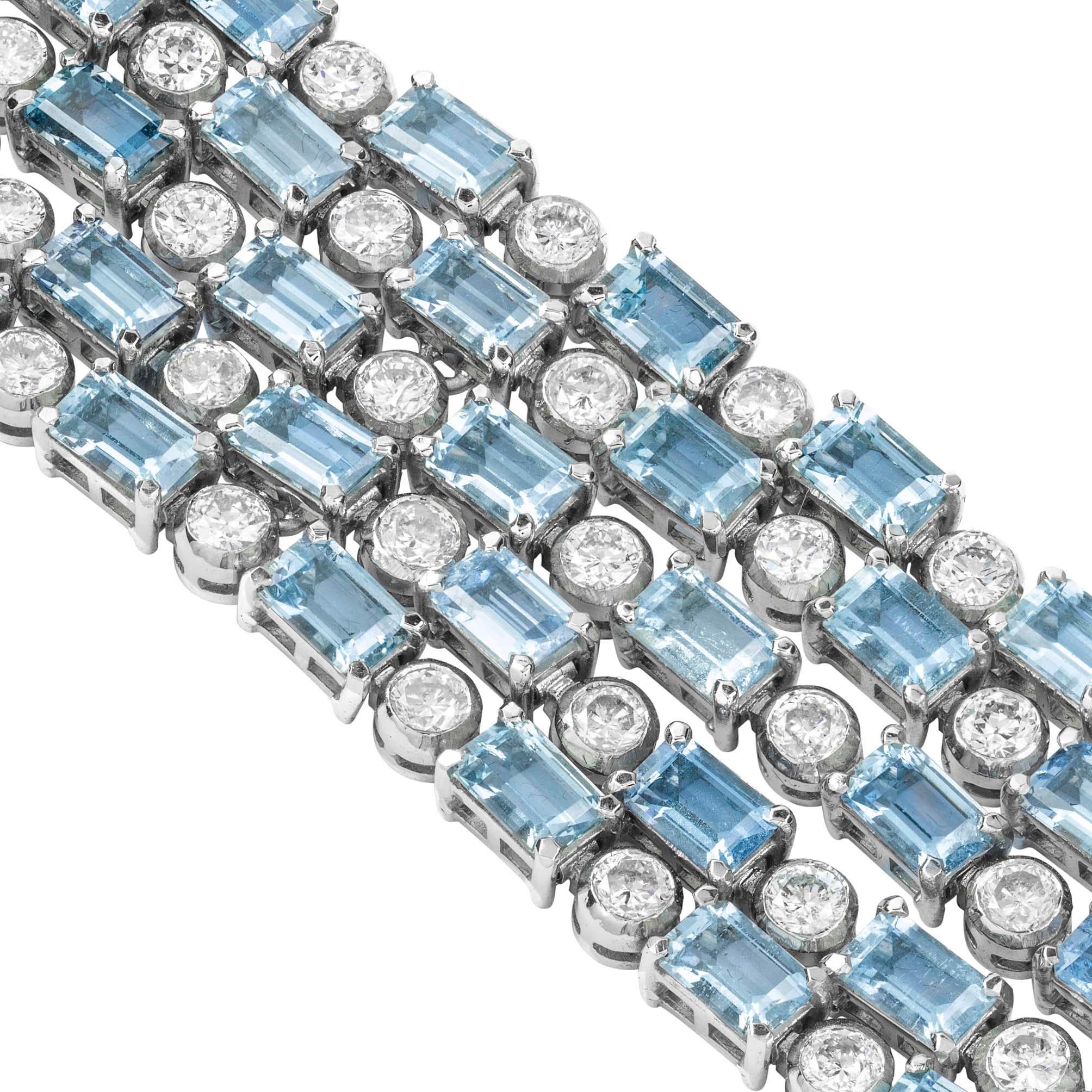An aquamarine and diamond bracelet, the five rows of alternate set emerald-cut aquamarines, estimated to weigh a total of 35.5 carats, and  round brilliant-cut diamonds, estimated to weigh a total of 11 carats, four claw and rubover set,