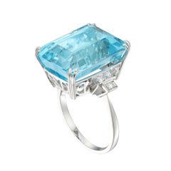 An aquamarine and diamond ring