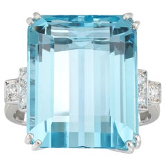 An aquamarine and diamond ring