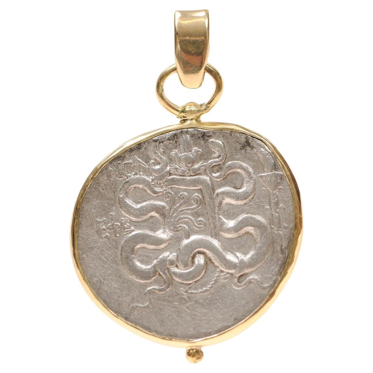 An AR Tetradrachm Cista Mystica Pendant with 18 Karat Gold (pendant only) For Sale