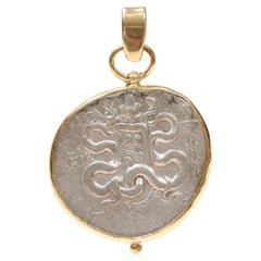 An AR Tetradrachm Cista Mystica Pendant with 18 Karat Gold (pendant only)