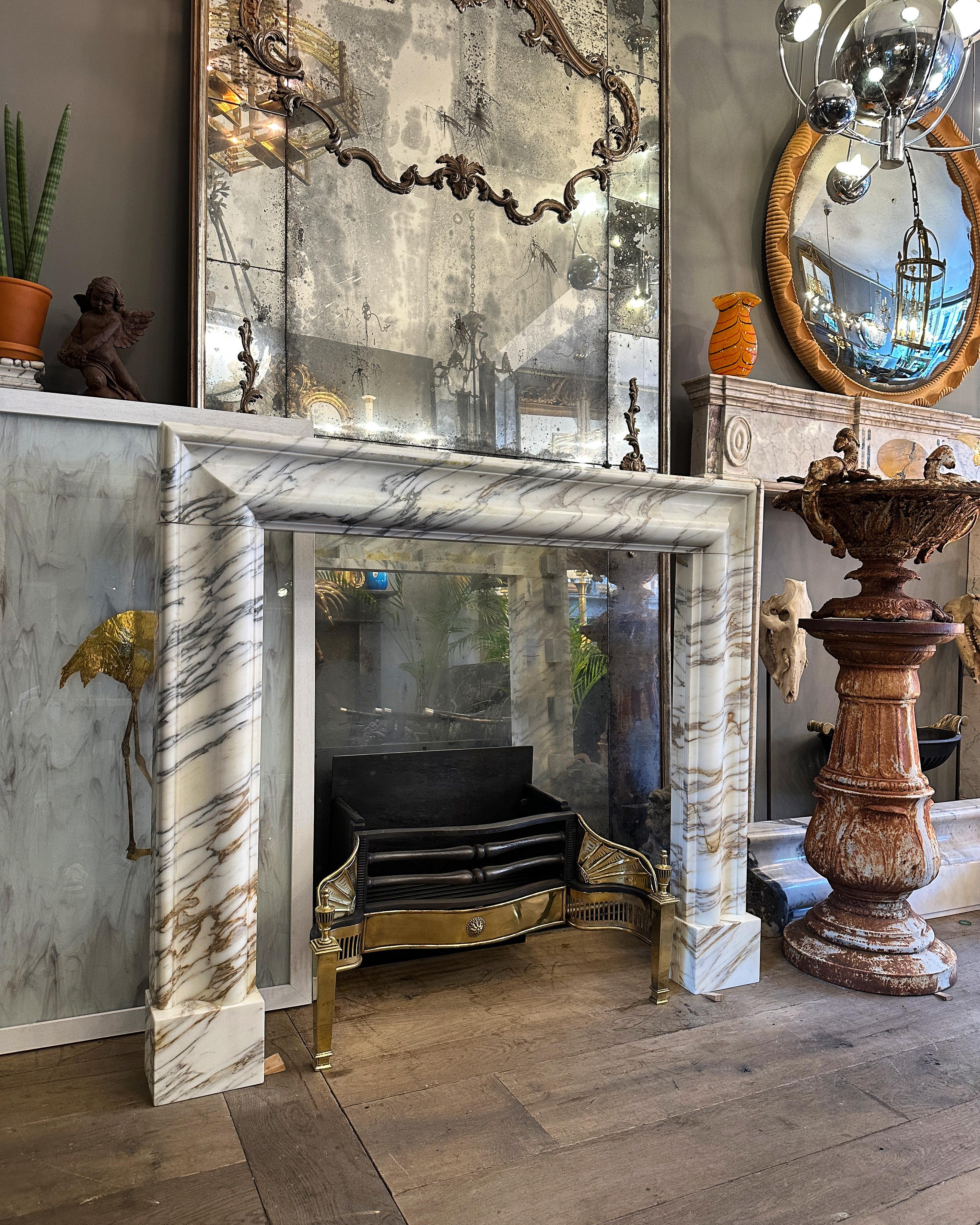 An Arabescato Marble Bolection Fireplace Mantle  For Sale 1