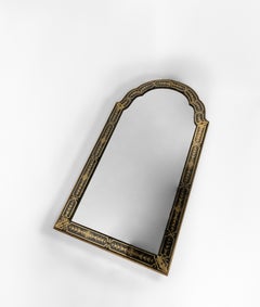 An Arched Mirror with a Reverse Glass Decorated frame