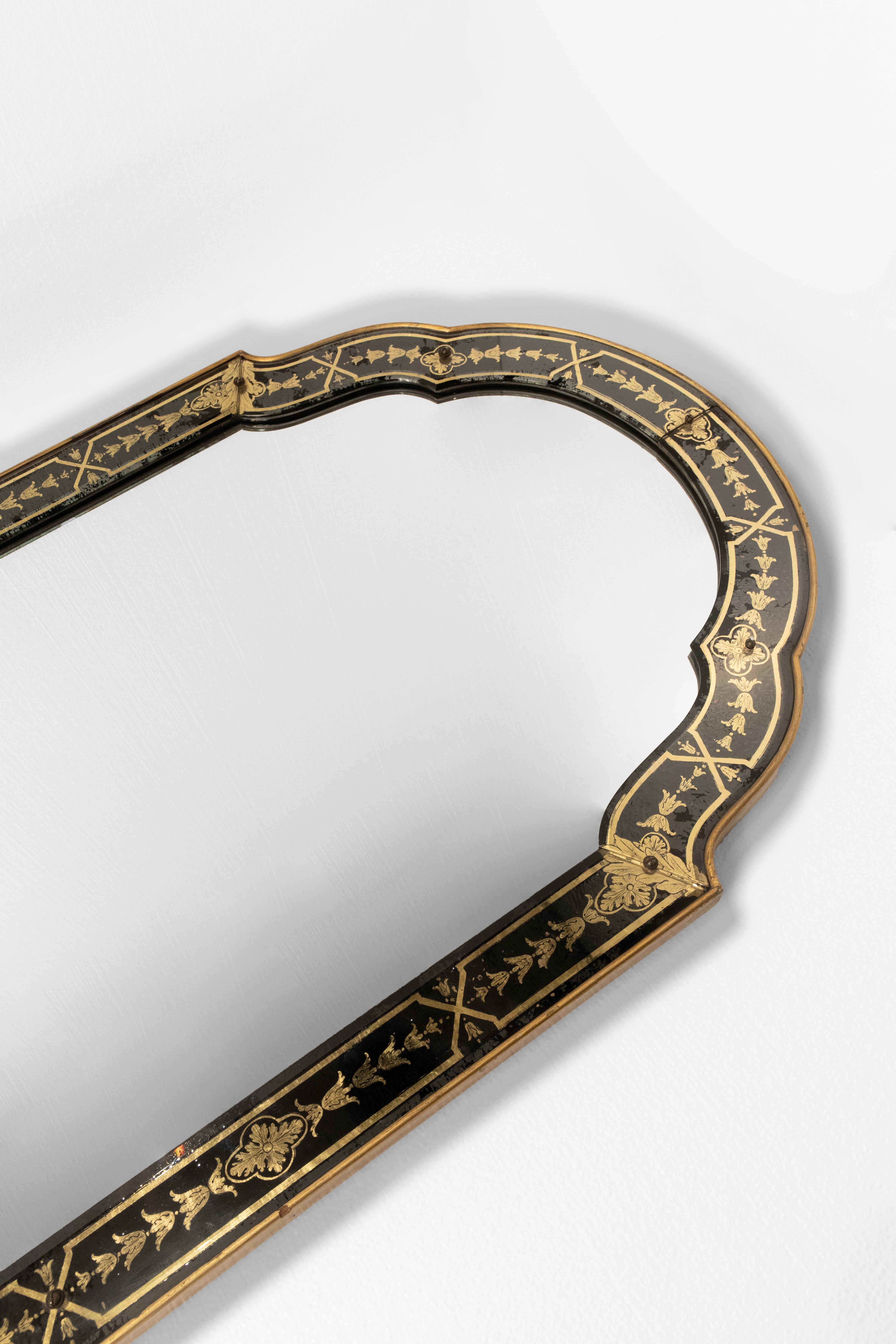 American An Arched Mirror with a Reverse Glass Decorated frame For Sale
