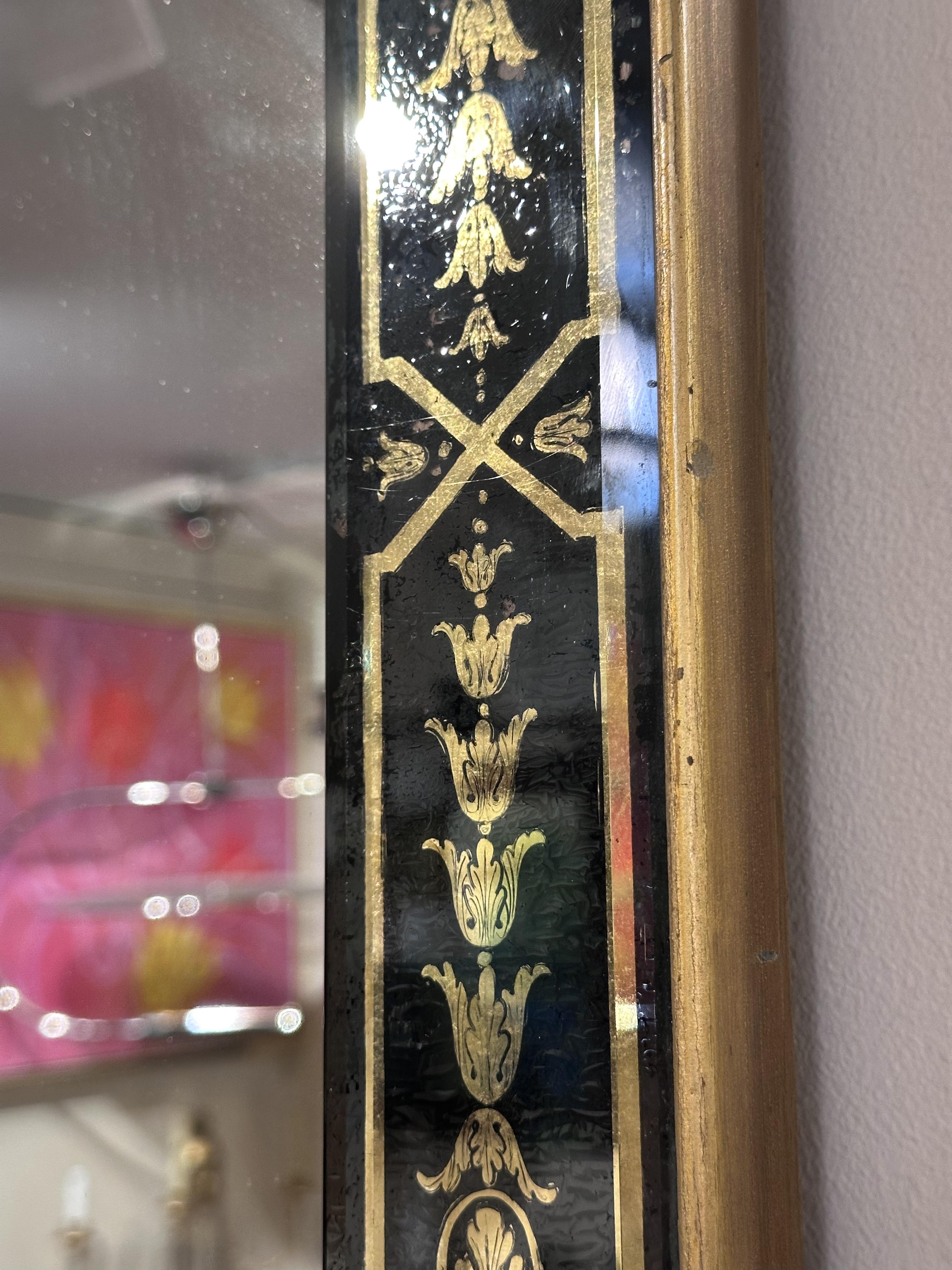 An Arched Mirror with a Reverse Glass Decorated frame For Sale 1