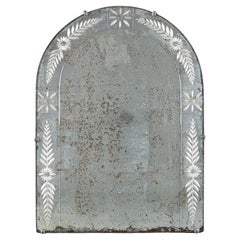 An Arched Venetian Glass Mirror with Engraved Borders