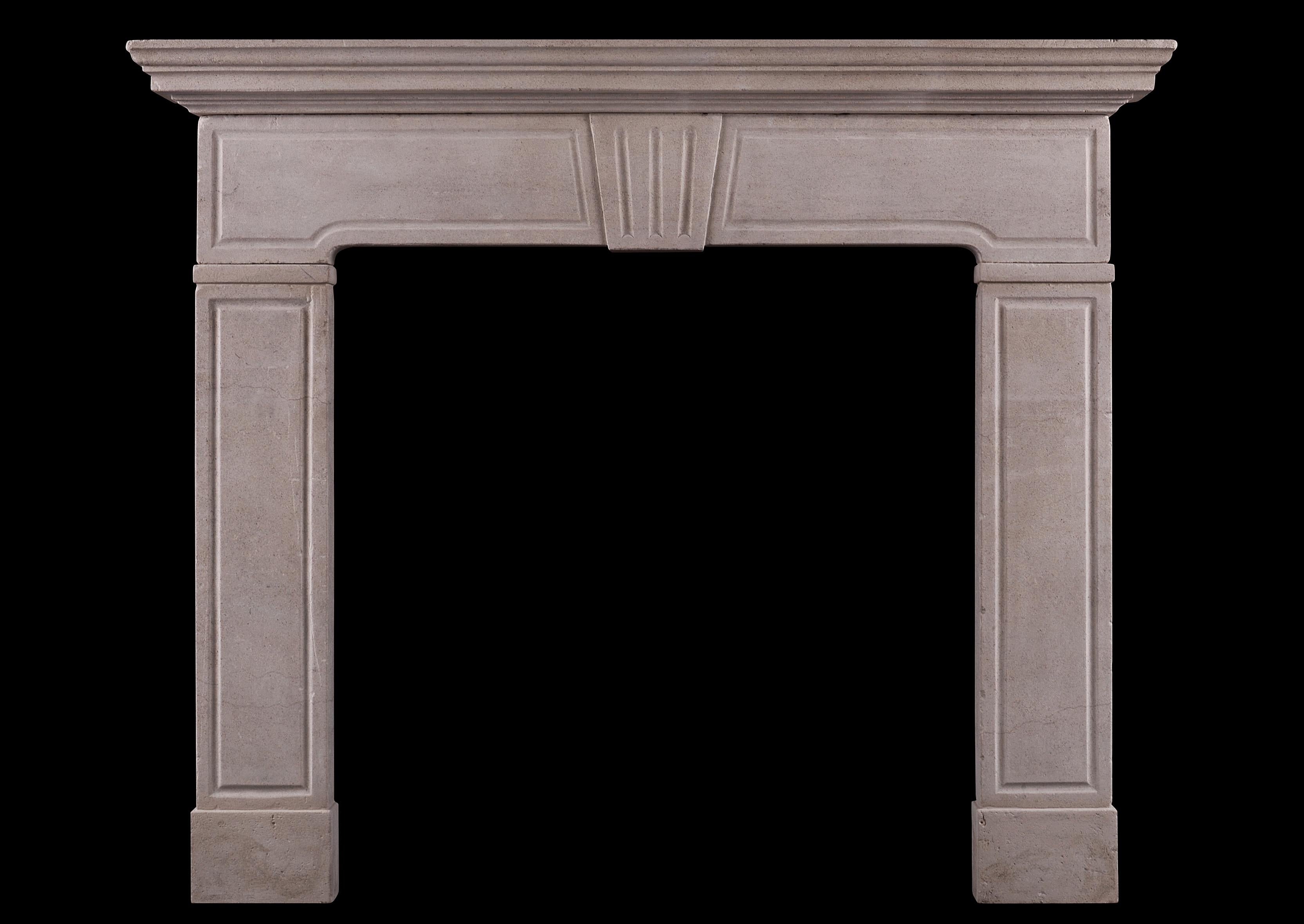 An architectural limestone fireplace in the late Regency manner. The panelled jambs surmounted by shaped frieze with fluted key stone to centre. Moulded shelf above. English, 19th century.

Measures: Shelf width: 1390 mm 54 ¾