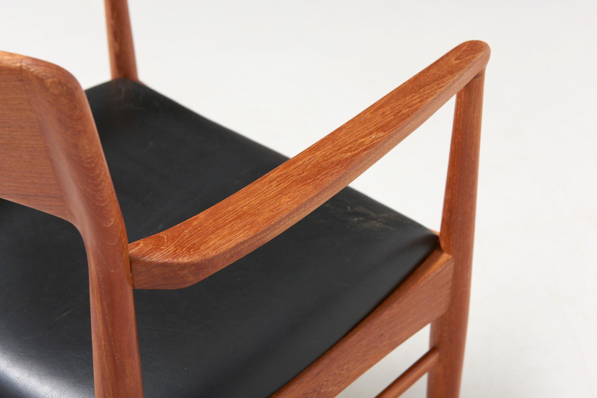 An armchair in teak made by K.S. Møbler. Original leather seat. Made in Denmark in the 1950s.