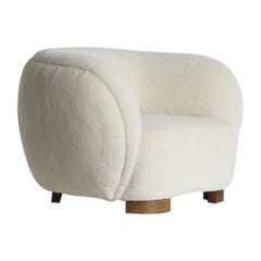 Un sillón tapizado en alpaca pura