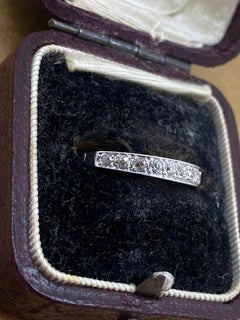 An Art-Deco 12-Stone Grain Set Old Cut Diamond (0.50ct) Band in 18K White Gold