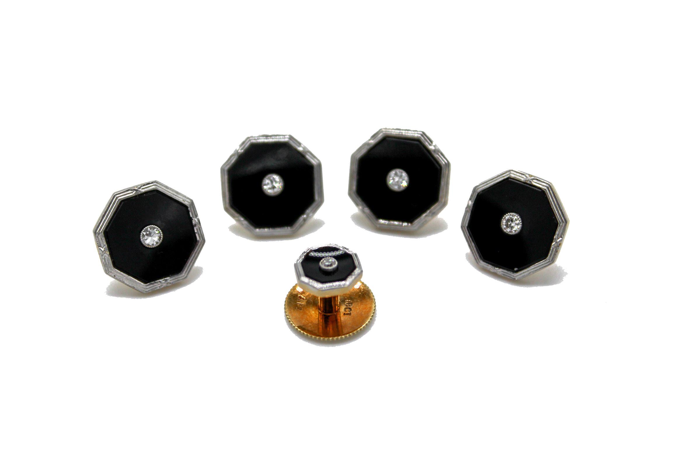 A Gentleman' Art Deco 18 Kt Gold, Platinum & Diamond Tuxedo Dress set, comprising a pair of cufflinks, four buttons and two collar studs. Each 12 mm octagonal button and cufflink backed with 18 karat yellow gold, the black onyx face edged in