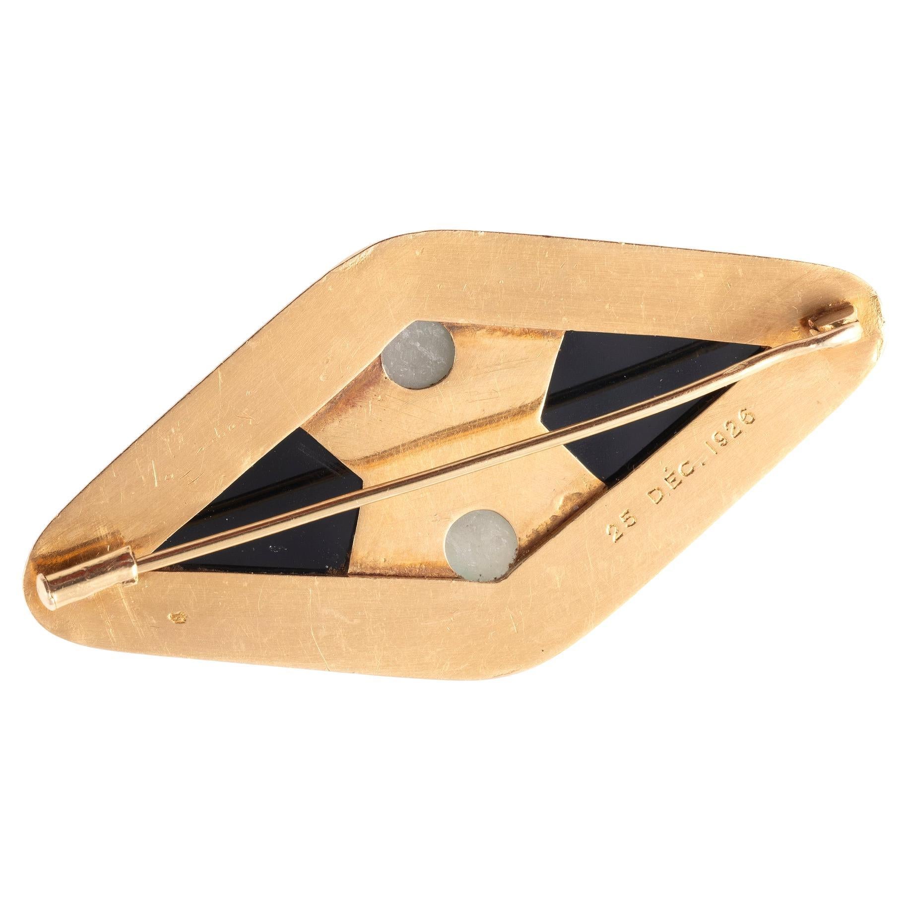 Art deco' 18kt yellow gold parure in geometrical design, with onyx and jade.
Circa 1925's
Signed René Foy 
Total weight: 38.67gr.