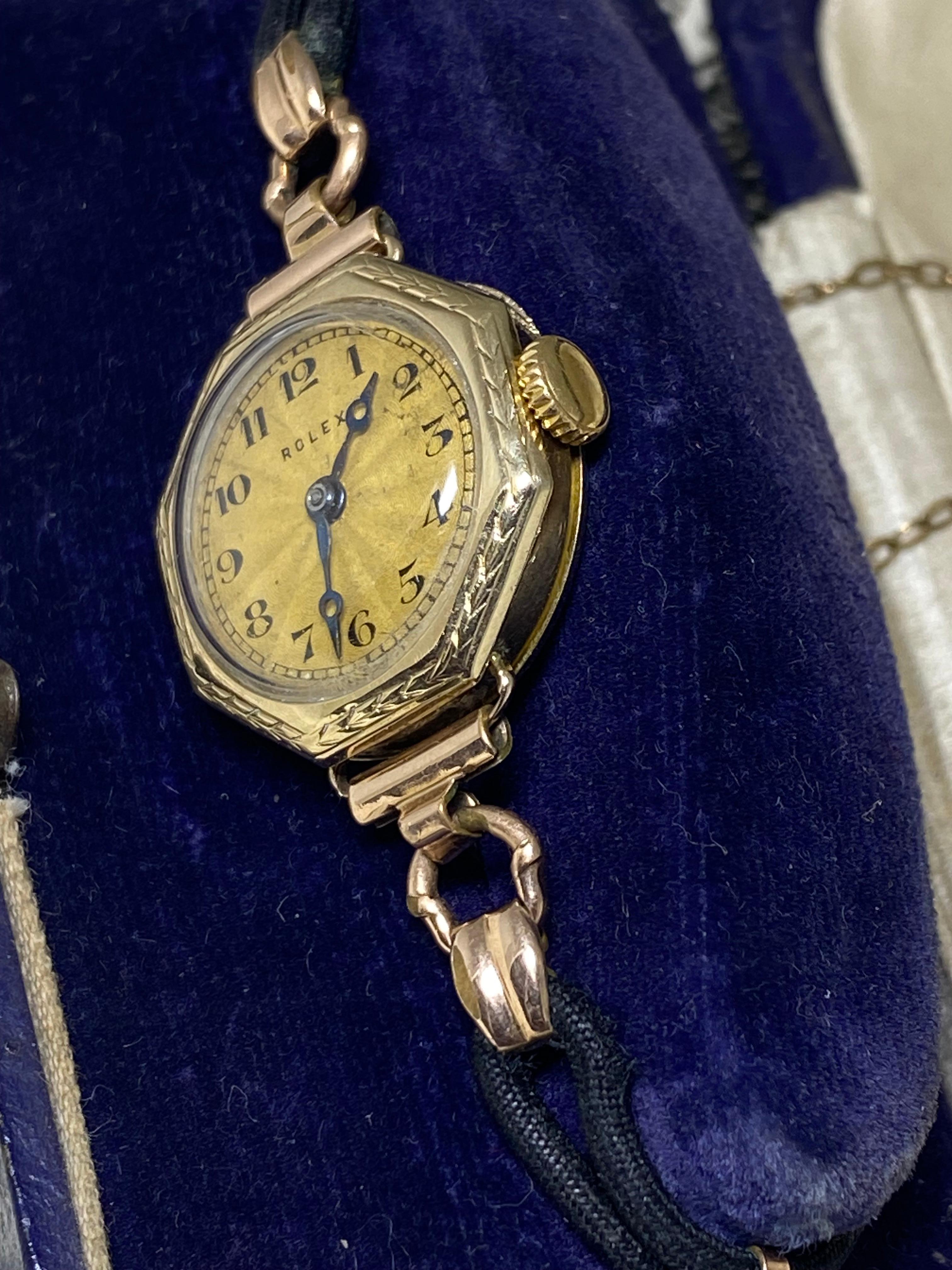 Elegant & Rare Gold Rolex ladies' wristwatch, 
dating back to an Art-Deco period - circa 1930's - features:

Rarely seen Octagon Shaped Hinged Case, 
crafted in 9K Yellow Gold 
(stamped 9C, signed Rolex Geneva-Suisse & numbered 57762 on