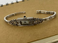 An Art-Deco 9K White Gold Diamond Rectangle Swiss Ladies’ Cocktail Watch