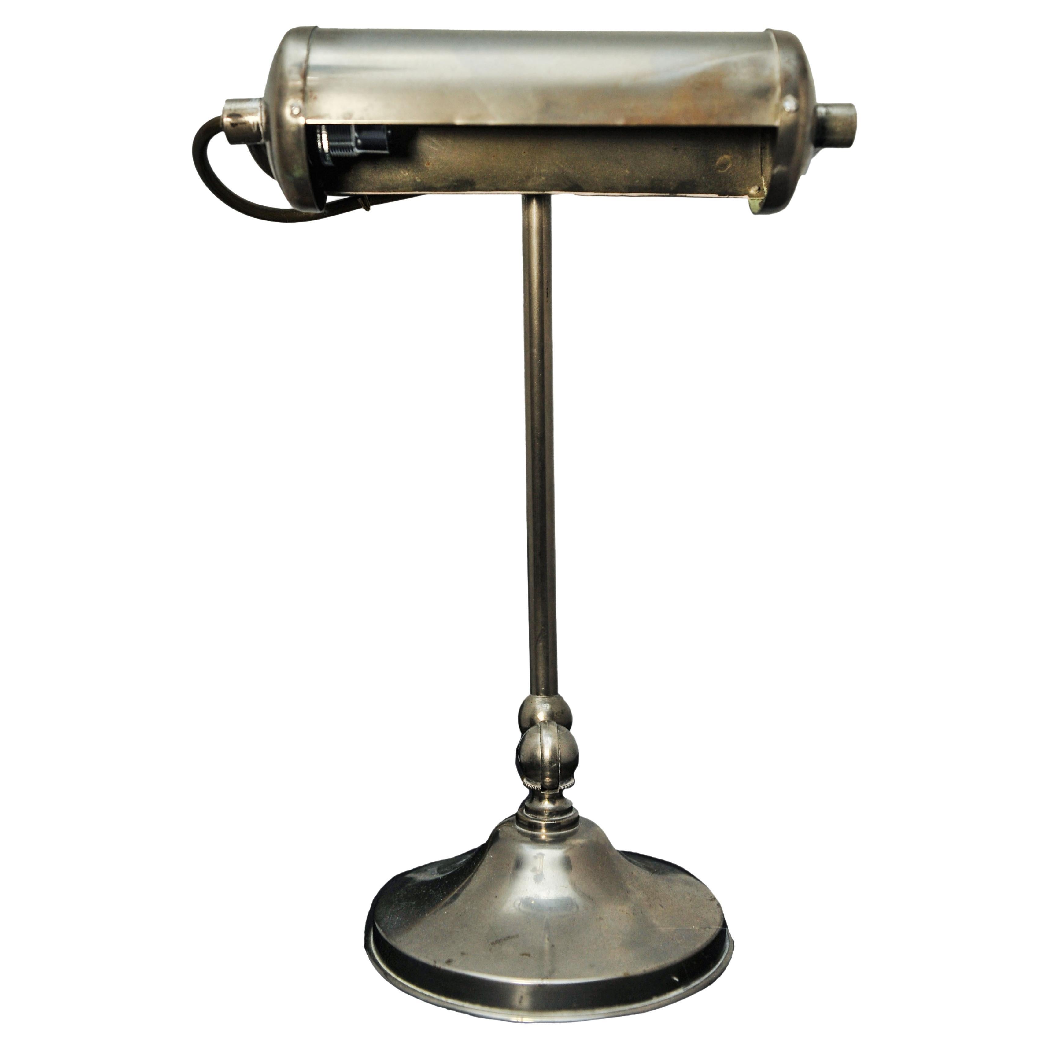 An Art Deco Adjustable Chrome Bankers Desk Lamp On A Circular Base. Manufactured In 1920's.
