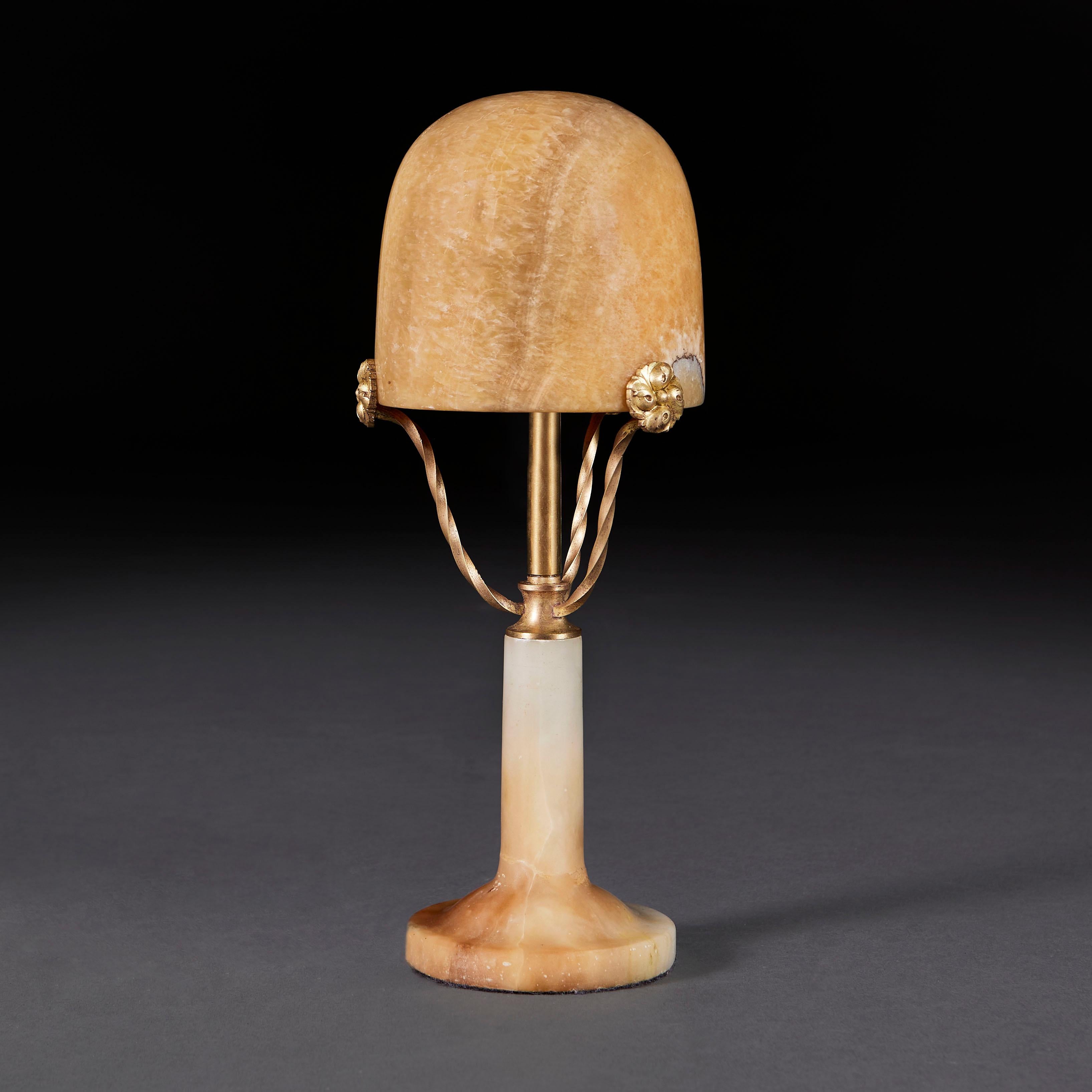 France, circa 1930

A rare early twentieth century alabaster desk lamp of diminutive form with gilt bronze uprights terminating in paterae with domed alabaster shade.

Height 32.00cm
Diameter 13.00cm

Please note: This is currently wired for the UK
