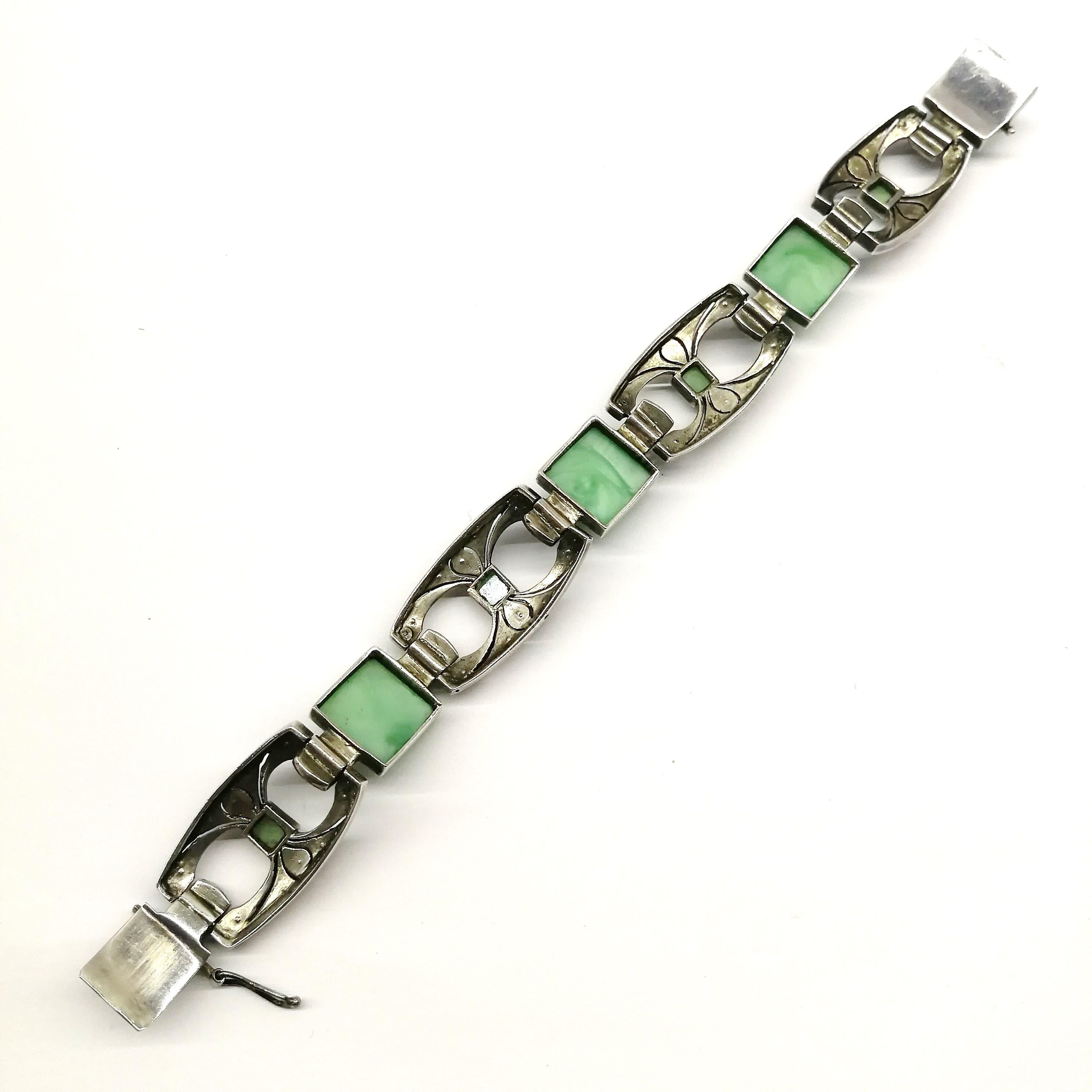 Cabochon An Art Deco amazonite, sterling silver, enamel and marcasite bracelet, 1930s
