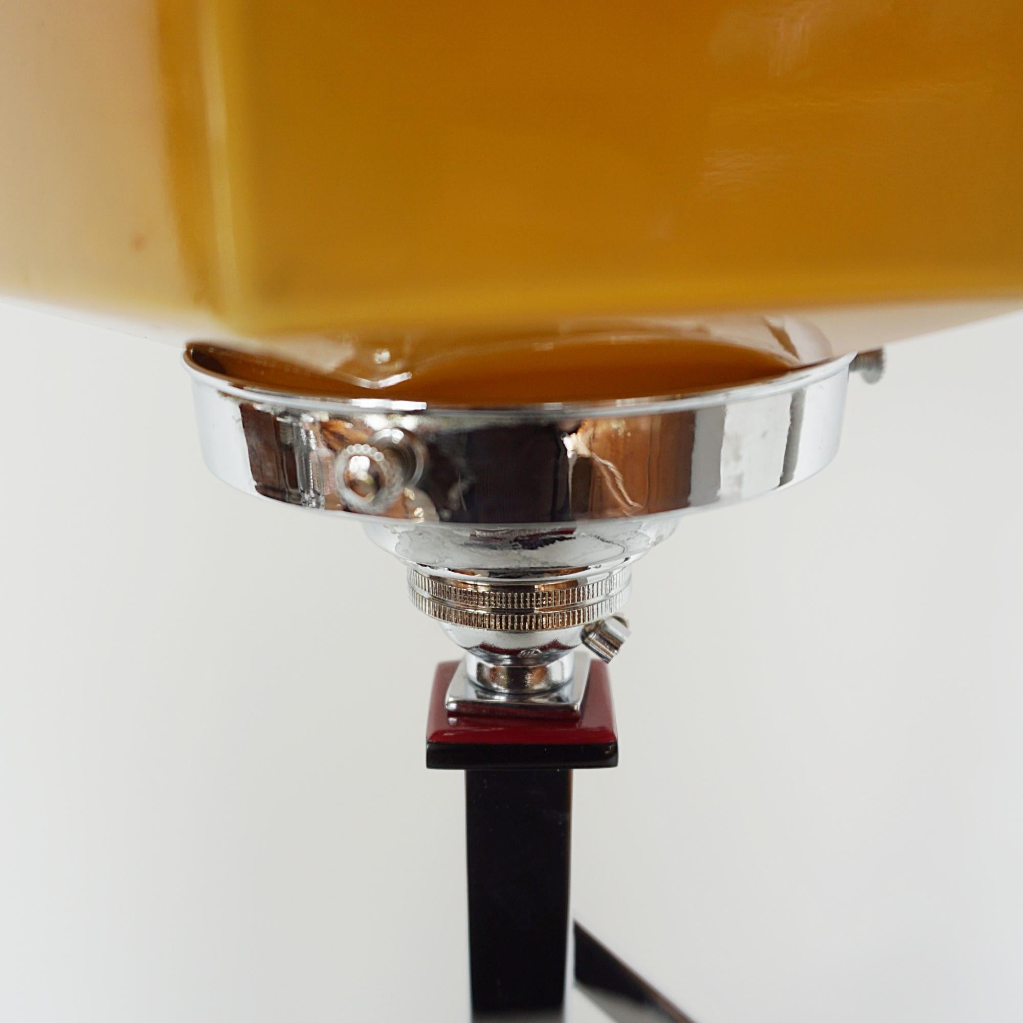Mid-20th Century An Art Deco Amber Glass and Bakelite Table Lamp